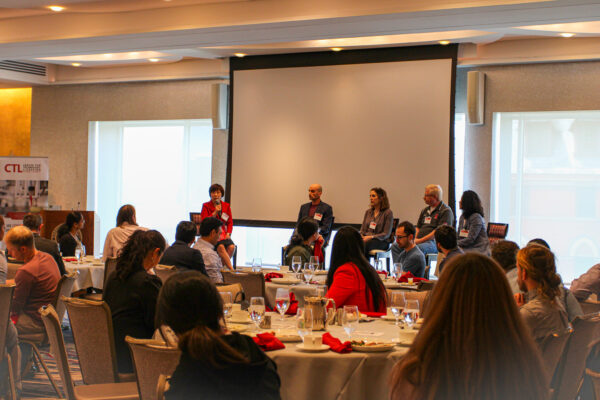 Panelists during the "Building Bridges from Scientific Discovery to Societal Impact"